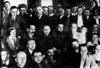 A group of writers with the head of the White Sea Canal (second row, fourth from the right). 1933.