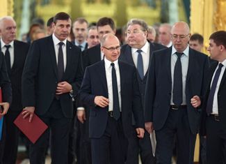 Sergey Kiriyenko (center) before a State Council session in June 2019