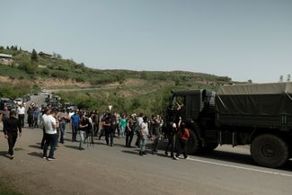 Kirants residents work in shifts to ensure there’s always somebody blocking the road. If a military vehicle tries to cross the Kirants River and enter the village, protesters walk onto the road to prevent it from passing; they specifically don’t want to allow sappers to demine the border territories. Emergency service vehicles and cars belonging to local residents are allowed through.