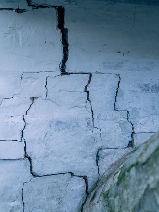 Cracks in the wall of Volodymyr’s cellar that formed after the floodwater caused the house’s foundation to sink. November 2022.