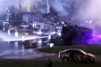 Police in Minsk use water cannons to disperse demonstrators on August 9, 2020