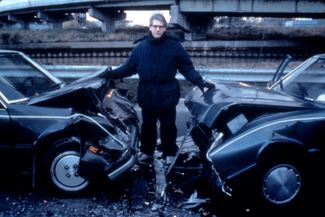 Дэвид Кроненберг на съемках «Автокатастрофы»
