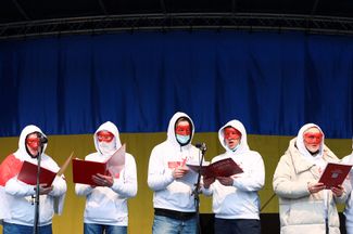 Participants of the Volny [“Free”] Choir from Belarus perform at a demonstration against Russia’s invasion of Ukraine on Berlin’s Bebelplatz Square. March 6, 2022
