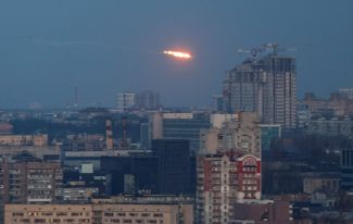 A missile explodes above Kyiv