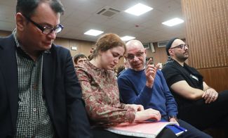 Yury Itin, Sofya Apfelbaum, Alexey Malobrodsky, and Kirill Serebrennikov attend a court hearing on November 7, 2018