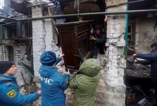Жилой дом в Донецке, поврежденный в результате обстрела со стороны ВСУ