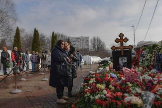 Navalny’s mother, Lyudmila Navalnaya, and mother-in-law, Alla Abrosimova, visit his grave in Moscow’s Borisovskoye Cemetery. March 2, 2024.