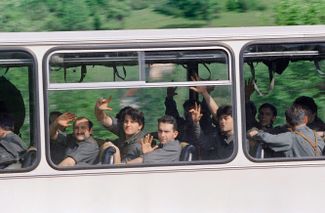 Soldiers from the Yugoslavian army after being released from the barracks, where Bosnian Muslim forces blocked them in for a month. June 1992.