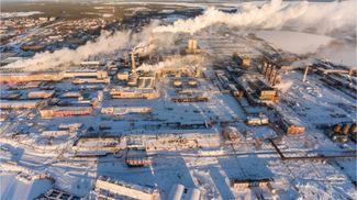Aerial view at the area of Pulp and Paper mill in Segezha town at winter season. Republic of Karelia, Russia, 16 Jan 2017