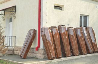 Coffins placed outside a morgue in Stepanakert. September 24, 2023.