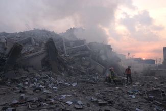 Разрушенное здание в Газе. 8 октября 2023 года