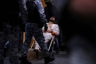 Muhammadsobir Fayzov in court. He was reportedly brought to the session directly from the ICU.