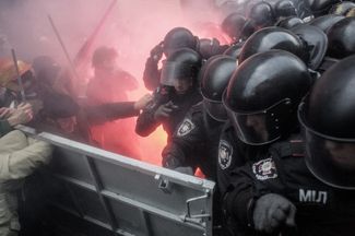 Police clash with demonstrators near the building on Bankova Street that houses the presidential administration of Ukraine. December 1, 2013