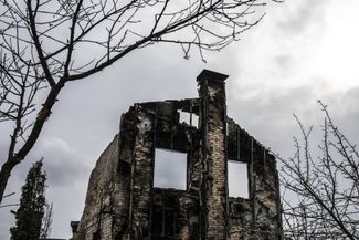 A building destroyed in combat in Moshchun, March 20, 2022