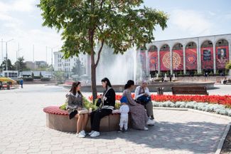 Women sitting on a bench in Ala Too Square in Bishkek, September 2023