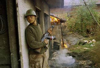 A Serbian soldier during a battle in the Bosnian village of Gorica. October 1992.