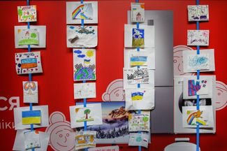Children’s drawings on display in one of Kharkiv’s subway stations