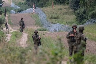 Polish soldiers on the border with Belarus. August 2021. 