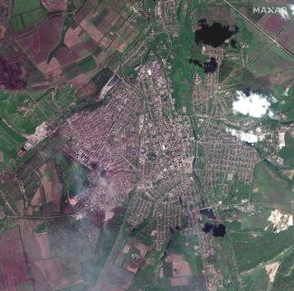 Спутниковый снимок Бахмута 8 мая 2023 года, показывающий, что за восемь месяцев боев и обстрелов город был практически полностью разрушен
