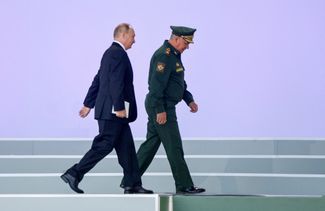 Russian President Vladimir Putin and Russian Defense Minister Sergey Shoigu