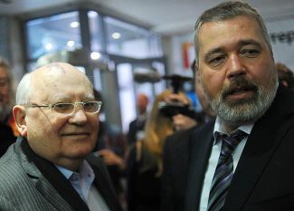 Gorbachev and Novaya Gazeta Editor in Chief Dmitry Muratov at an anniversary celebration for the publication. The former president of the USSR has been a shareholder in the newspaper since its founding. Moscow, April 2, 2013
