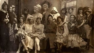 Guests pose at a wedding organized by Afanasy Shaur in Petrograd in 1921.