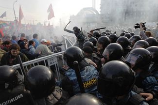 Clashes between protesters and police officers in Moscow on May 6, 2012.