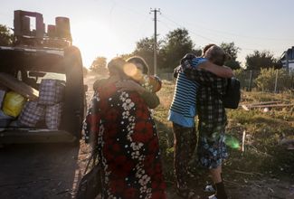 Ukrainian police officers and volunteers from the “Chaplain Patrol” public organization evacuate elderly residents from areas of the Zaporizhzhia region as the front line advances. August 14, 2026