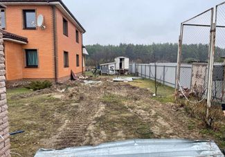 The yard outside Kristina’s home, torn apart by Russian military equipment