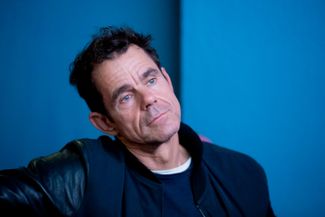 Режиссер Том Тыквер