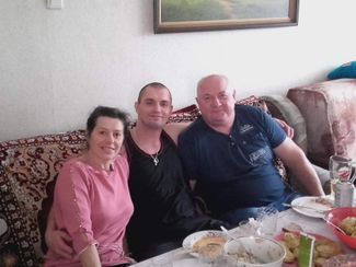 Sergey Maslov with his parents