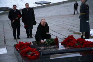 Putin places flowers at a war monument in Volgograd honoring the fallen heroes of Stalingrad on the battle’s anniversary