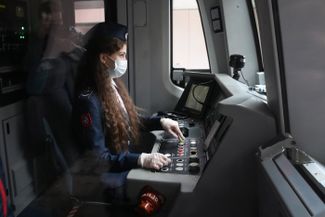 A female train driver at the Moscow Metro’s Fili train depot