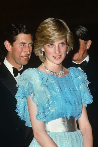 Принц Чарльз и принцесса Диана на благотворительном балу во время своей поездки в Австралию. Сидней, 28 марта 1983 года