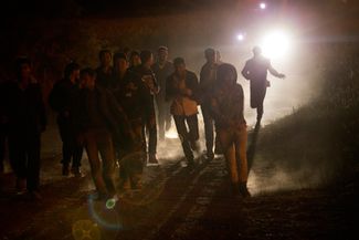 Мигранты убегают от полиции в Кале