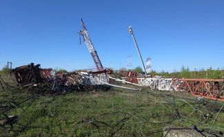 The damaged radio towers in the village of Maiac