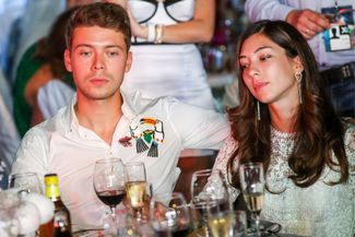 Ilya Medvedev and his girlfriend, Yana Grigoryan, at a "white party" in Sochi. September 4, 2018.