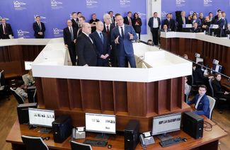 Prime Minister Mikhail Mishustin, President Vladimir Putin, and Moscow Mayor Sergey Sobyanin at the government’s coronavirus task force headquarters on March 17, 2020