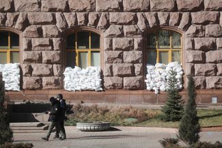 Sandbags protect the windows of the Kyiv city council building