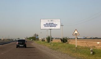 A billboard promoting the constitutional referendum in southern Uzbekistan
