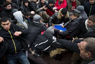 Clashes between Crimea Tatars and pro-Russian demonstrators at a demonstration outside of Crimea’s Verkhovna Rada in Simferopol. February 26, 2023.