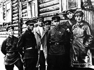 From right to left in the front row: Naftaly Frenkel, Belomorkanal’s chief manager of construction, Matvei Berman, head of the Gulag, and Afanasev, head of the southern division of the White Sea Canal camp.