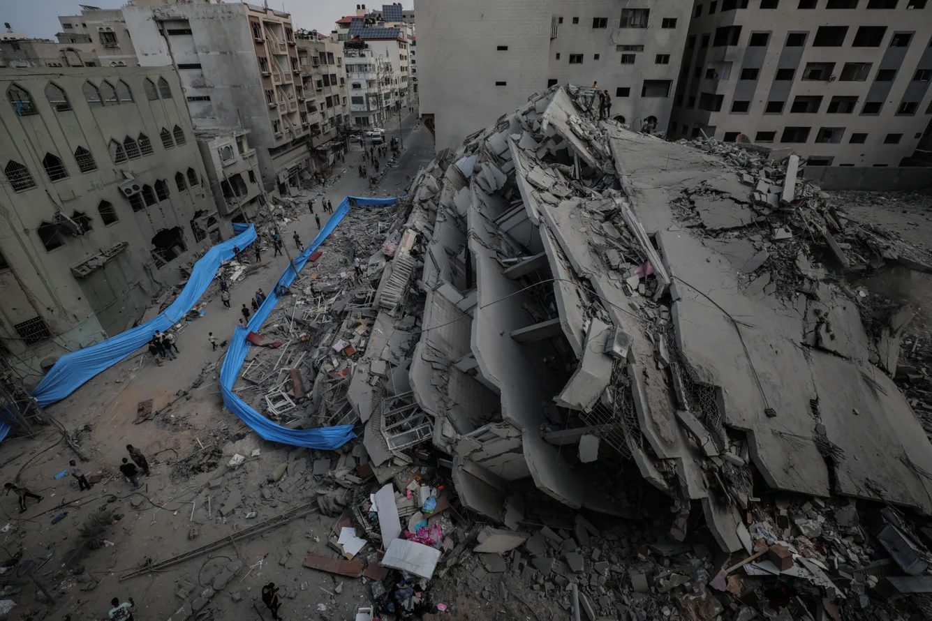 Одно из зданий в городе Газа, разрушенное израильской ракетой