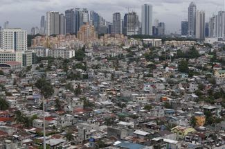 Бедные районы на окраине Манилы, 2013 год